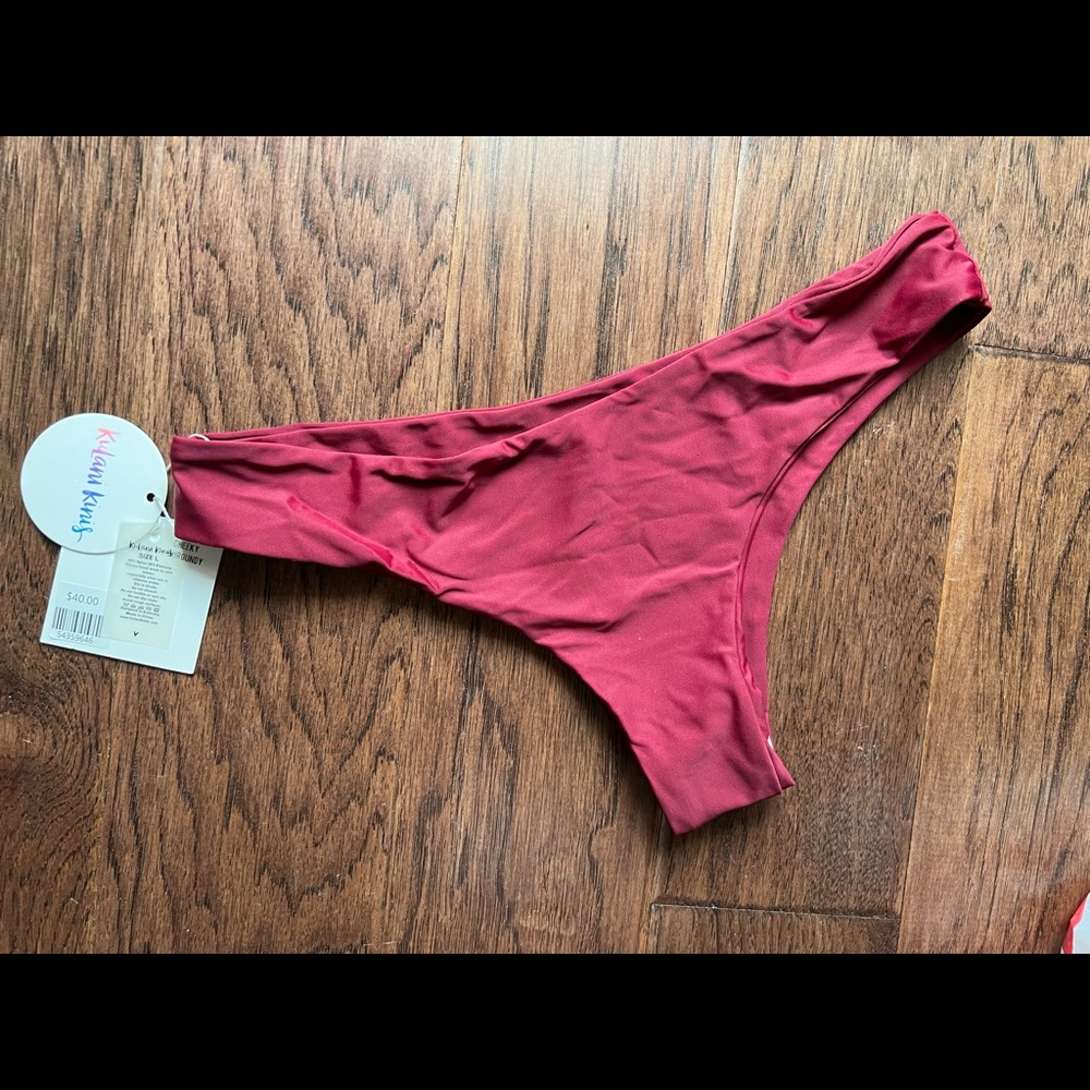 Size large new tags Kylani kini‘s swim bottoms